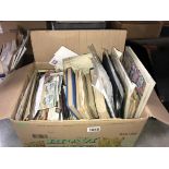 A box of mixed stamps including USA & Scotland etc.