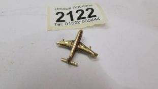 A 9ct gold aircraft pendant, 2.2 grams.