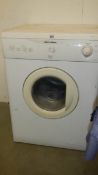 A Tricity Bendix TM220W tumble dryer with reverse action. (Collect only).
