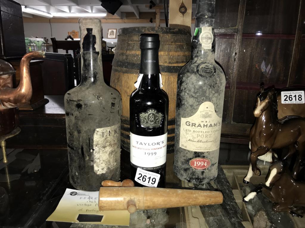 A 1963 Ferriera bottle of port, A small bottle of 1999 Taylors port,