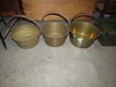 Three old brass jam pans.