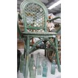 A cane garden chair.