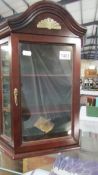 A small mahogany effect wall hanging shelf display unit 40 x 14 x h 47.