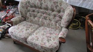 A good quality wood framed cottage suite comprising settee, chair, rocking chair and stool.