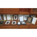 A quantity of mainly new photo frames.