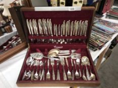 An ONEIDA Community boxed cutlery set approximately 90 + pieces (missing a few pieces)