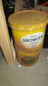Two old Snowcem cans.