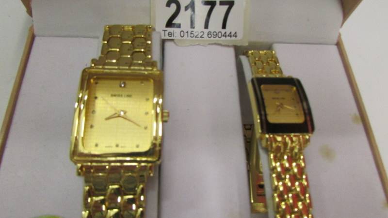 A boxed pair of ladies and gent's Swiss Line wrist watches. - Image 2 of 2