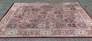 A large red & cream living room carpet (Approximately 293cm x 201cm)