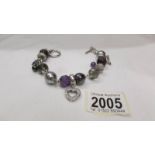 A Gento all silver heart bracelet.