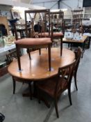 A teak extending dining table & 6 chairs (107cm x 163 x 73cm High)