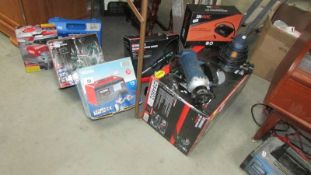 A good lot of boxed and unboxed tools including wet/dry grinder, Pnuematic chipping hammer etc.
