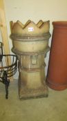 A large old chimney pot.