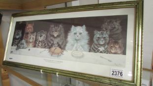 A framed and glazed Louis Wain print (What We Are About To Receive).