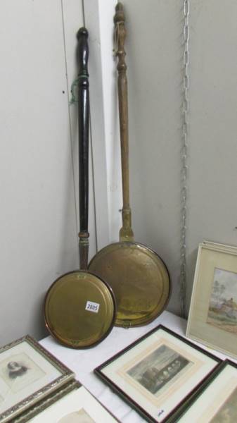 Two Victorian copper warming pans.