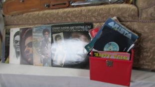 A good lot of 33 and 45 rpm records including a Johnnie Mathis collection.