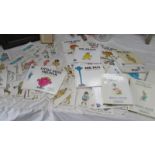 A quantity of Mr Men books and a set of old snap cards.