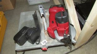 A Champion 18v cordless circular saw with charger and an electric tile cutter.