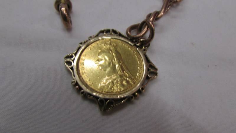 A Victorian 1889 sovereign on a 9ct gold watch chain (chain 43 grams) (Total weight 53. - Image 2 of 4