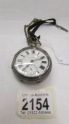 A silver pocket watch marked Fattorini & Sons, Bradford, in working order but has crack to dial.