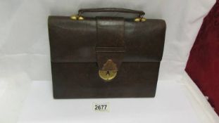 A circa 1920's ladies leather fitted writing case, missing key.