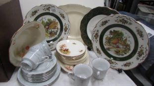 A mixed lot of plates and dishes.