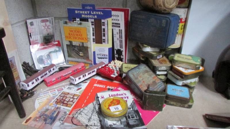 A mixed lot of vintage tins (most with contents) together with a mixed lot of railway related items.