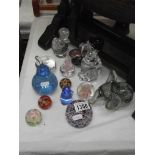 A quantity of glass paperweights