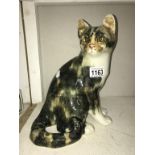A signed Winstanley sitting Tabby cat with glass eyes, size 5, no chips/cracks,