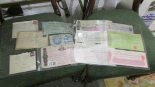 A collection of bank cheques, envelopes etc.