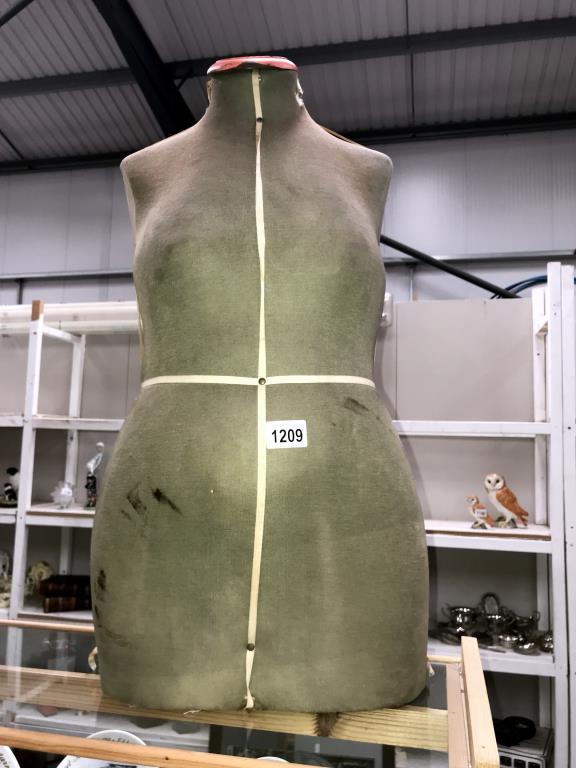 A vintage dress makers dummy