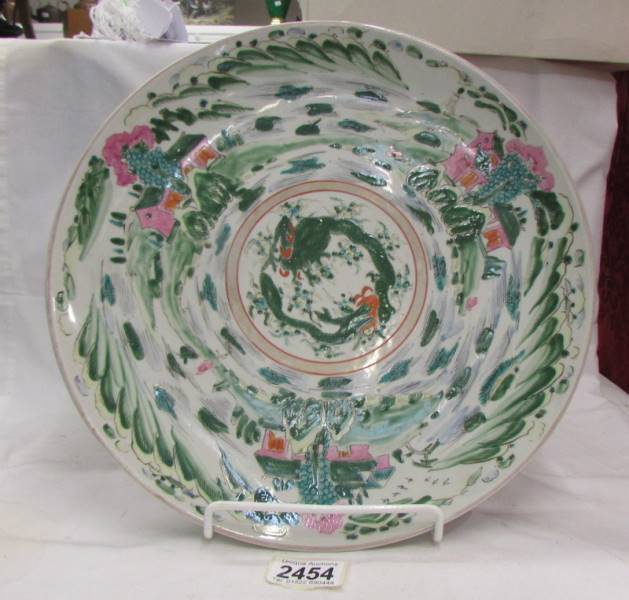 A 19th century hand painted Chinese charger. ****Condition report**** 33.