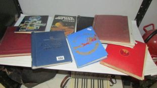 A quantity of stamp albums with stamps.