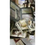 A large quantity of sepia, black & white photographs etc.