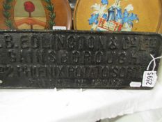 An old cast iron sign for J B Edlington & Sin, Gainsborough, potato sorter.