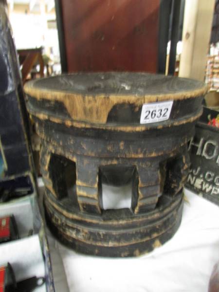 A Kuba Chief's carved wood stool with geometric design, a/f,