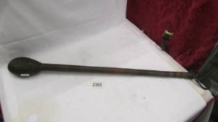 An early 20th century copper cosh, 64 cm long.