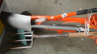 A quantity of garden tools.