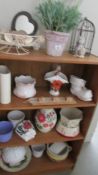 Four shelves of plant pots etc., (Collect only).