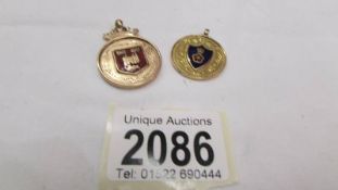 Two 9ct gold and enamel fobs, 11 grams.