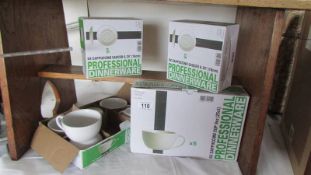 12 boxed professional tea ware cups and saucers.