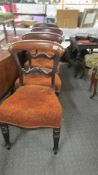 A good set of four Victorian mahogany dining chairs with deep buttoned seats.