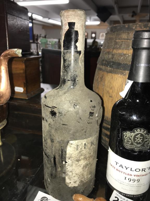 A 1963 Ferriera bottle of port, A small bottle of 1999 Taylors port, - Image 3 of 6