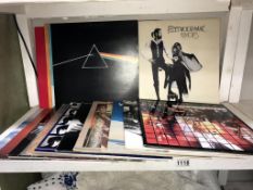 A quantity of LP records (approximately 20) 16 LPs & 4 x 12" including Queen, Fleetwood Mac, U2,
