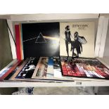 A quantity of LP records (approximately 20) 16 LPs & 4 x 12" including Queen, Fleetwood Mac, U2,