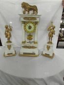 A white marble and gilt clock garniture - The clock being a four pillar design and mounted with a