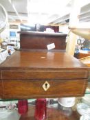 A mahogany sewing box and one other.