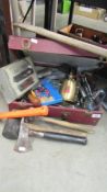 A tool box with assorted tools,