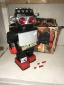 A 1970's 13" Saturn battery operated walking robot (no battery cover & working order unknown)