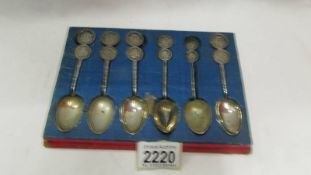 A set of six Chinese spoons (possibly silver).